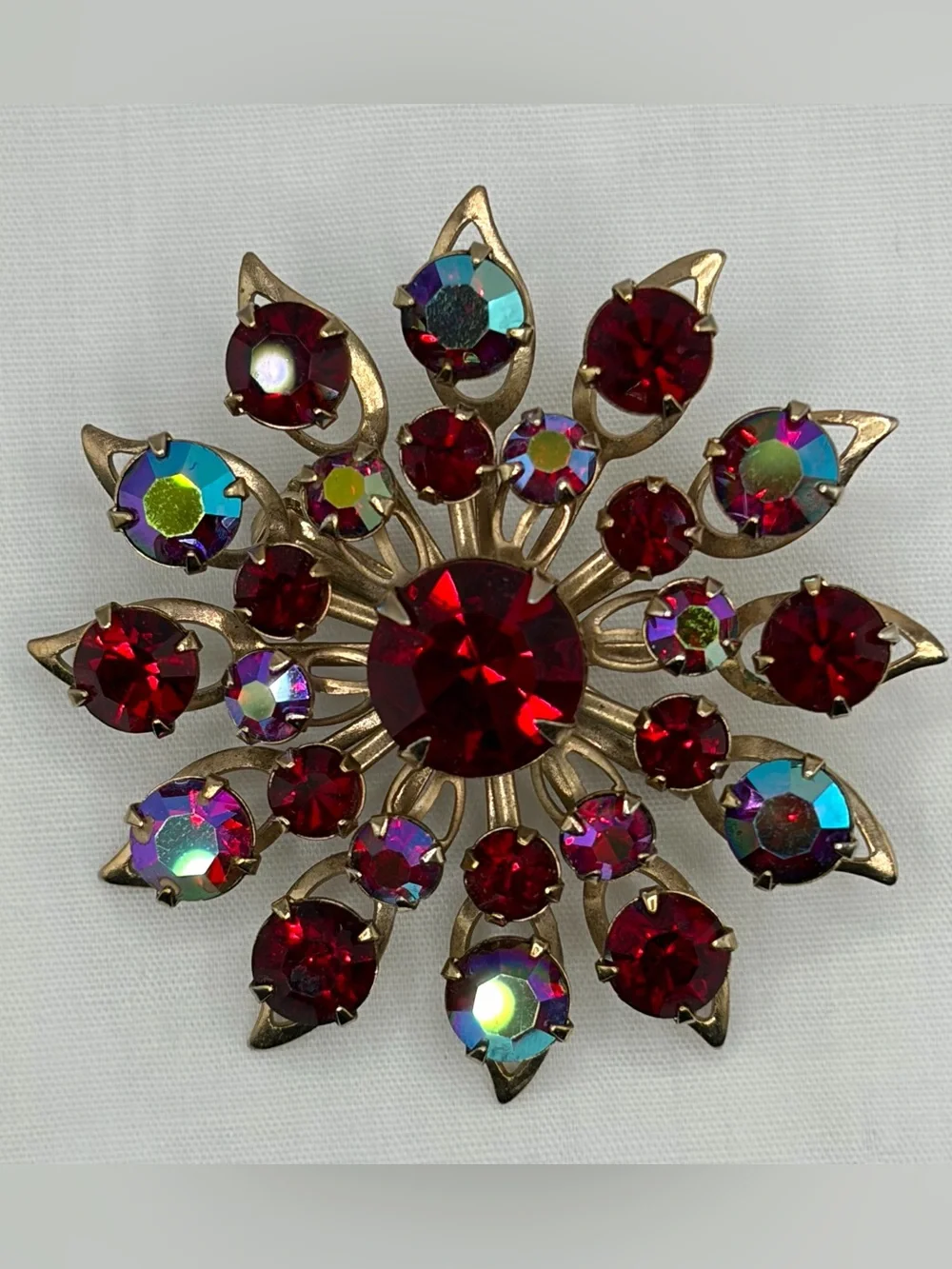 Vintage Starburst Brooch Pin Goldtone Faceted Deep Red Iridescent Rhinestones